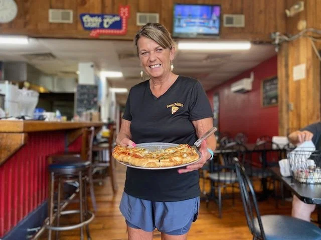 All in the Family Grill and nearby storefronts